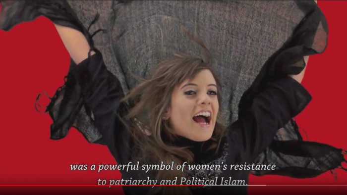 Screenshot from ex muslim video - woman lifting veil