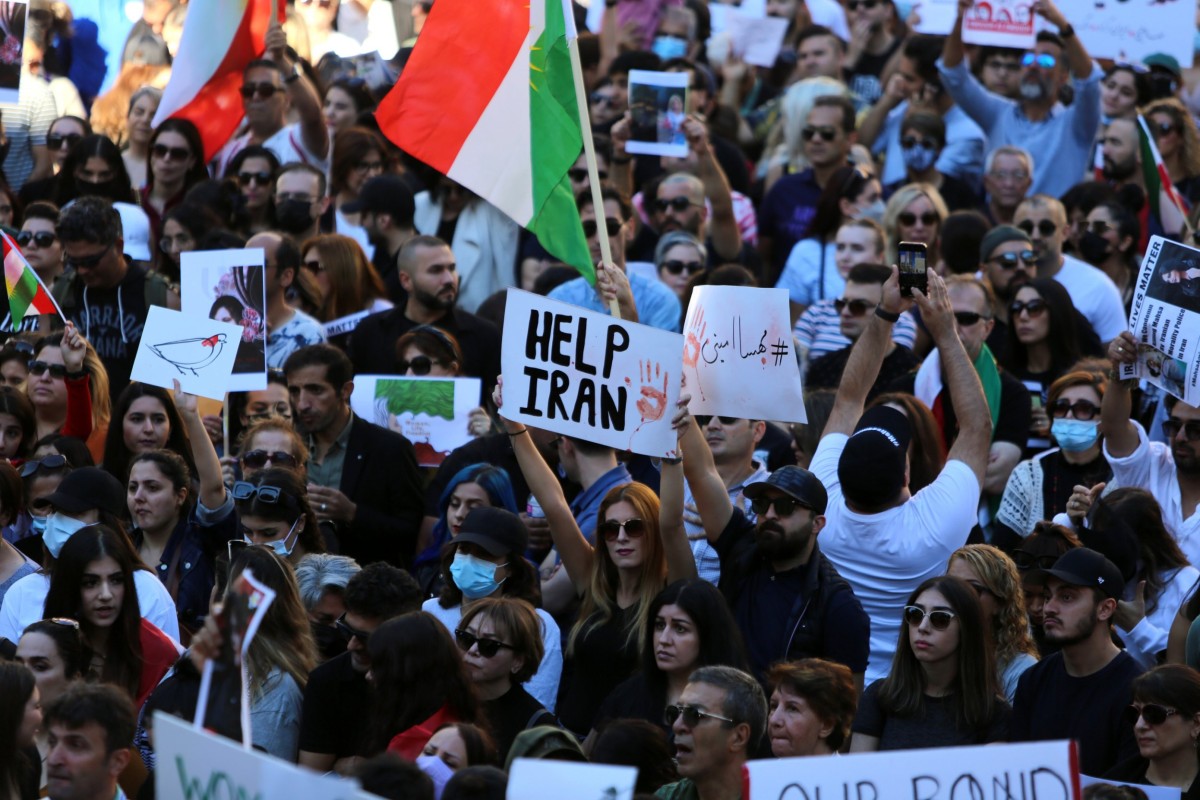 VANCOUVER, BC - SEPTEMBER 25 : Thousands of people gather outside Vancouver Art Gallery, during a solidarity protest for Mahsa Amini, a 22 years old Iranian woman who died under custody by Iran